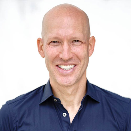 Professional headshot of Ari Redbord