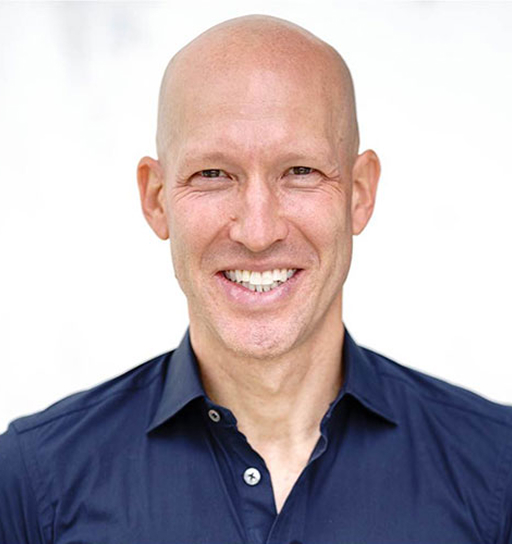 Professional headshot of Ari Redbord