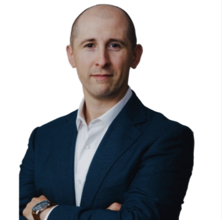 Professional portrait of Carlos Moreira in a suit
