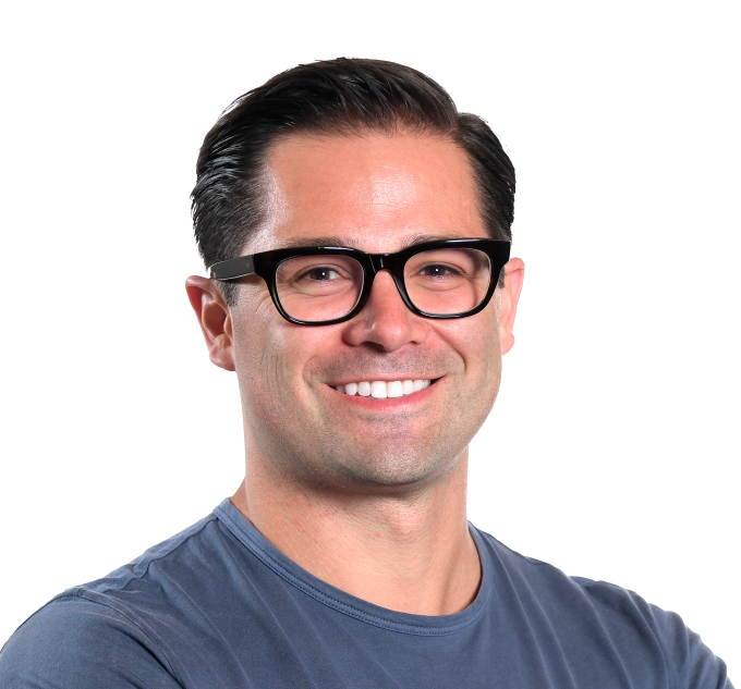 Professional portrait of Daniel Casanas wearing glasses