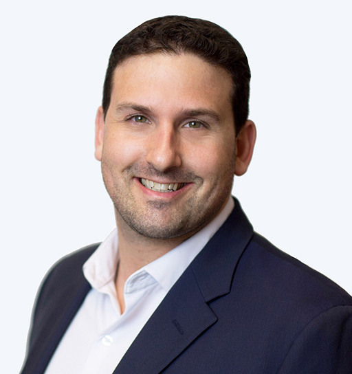 Professional headshot of Evan Schnidman